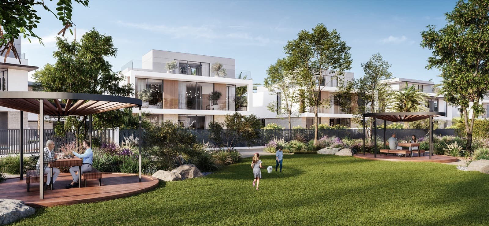 Render of townhouses at Farm Gardens 2, The Valley, with a shaded garden pavilion and lawn