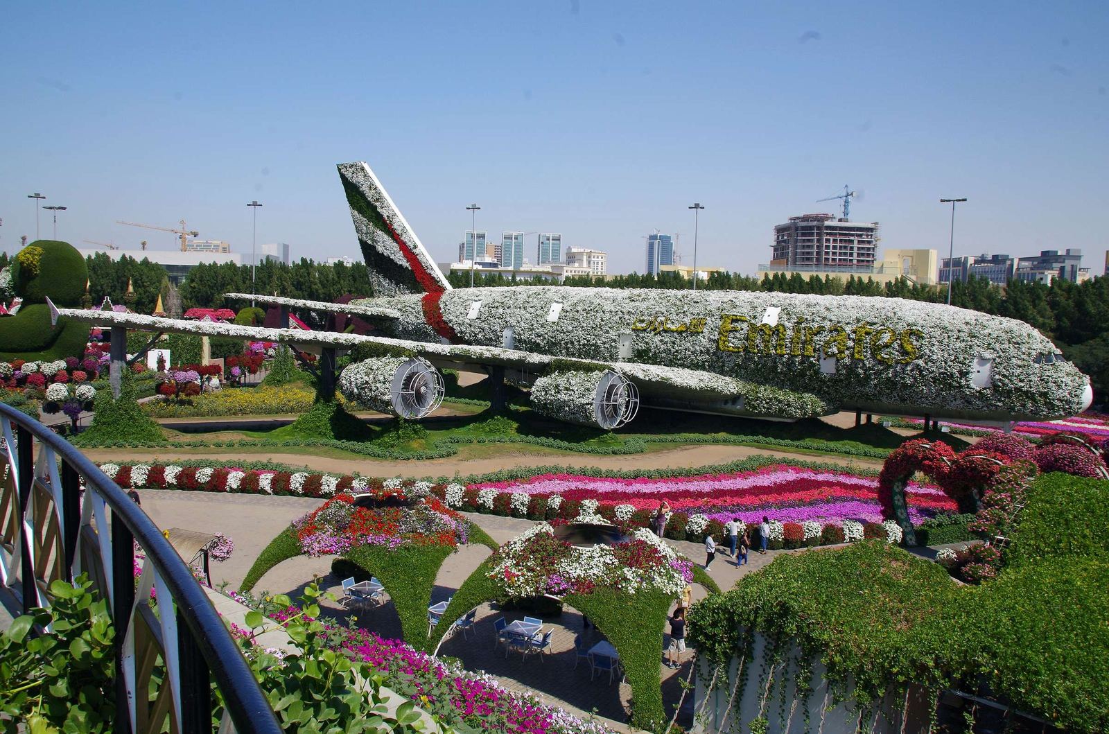 Flower covered Emirates A380 sculpture and colourful flower beds at Dubai Miracle Garden near Arjan, Dubai
