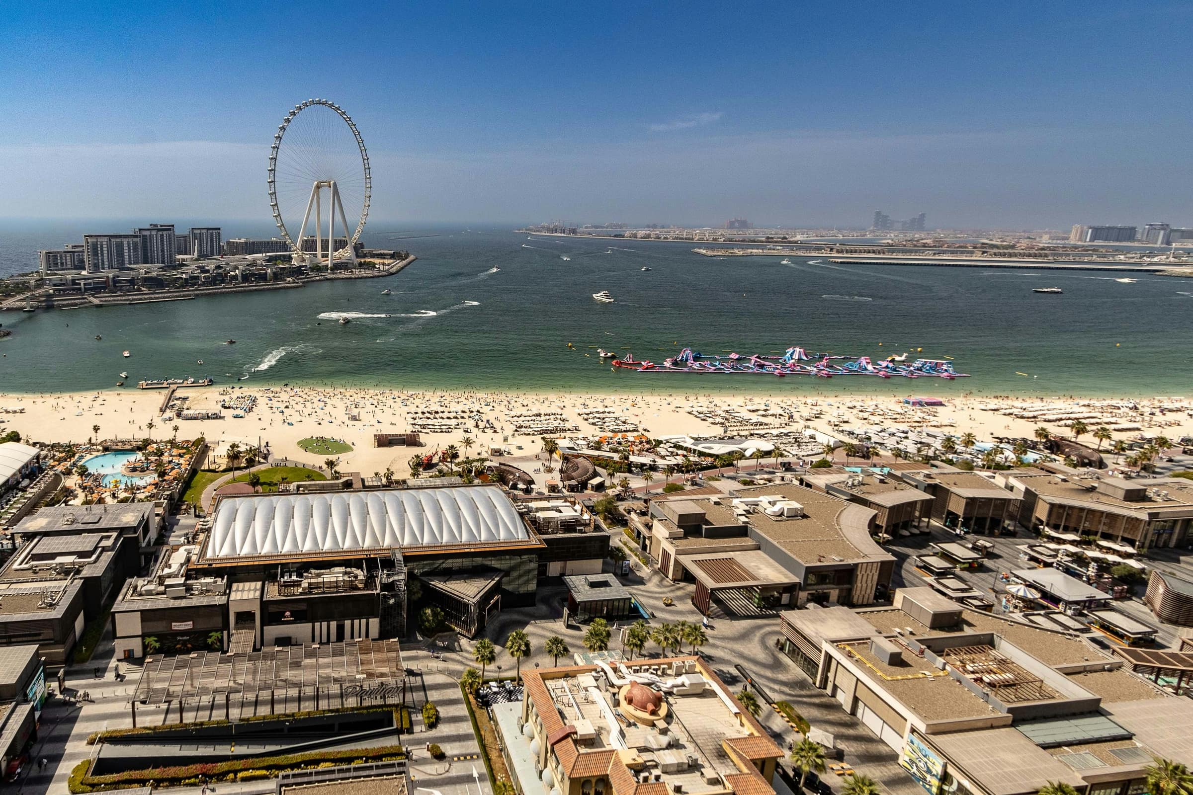 Jumeirah Beach Residence beachfront and The Beach, with Bluewaters Island and Ain Dubai offshore