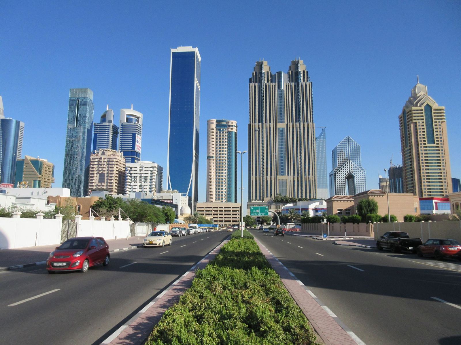 Al Satwa street view towards the Sheikh Zayed Road towers, the area of Jumeirah Garden City in Dubai