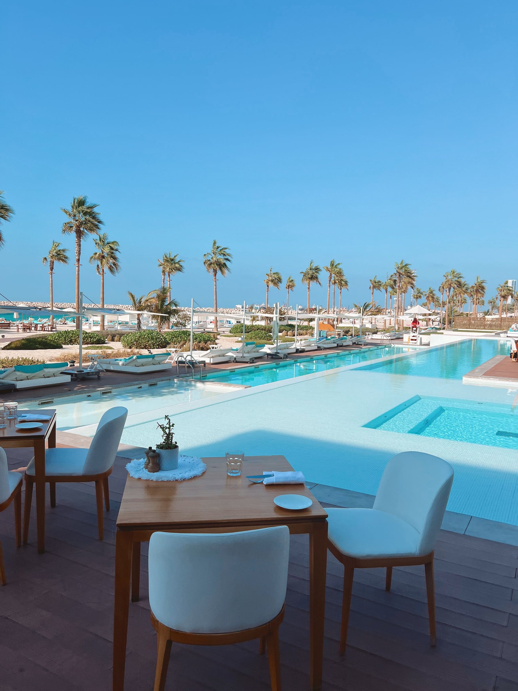 Poolside terrace at the Nikki Beach resort on Pearl Jumeirah, Dubai